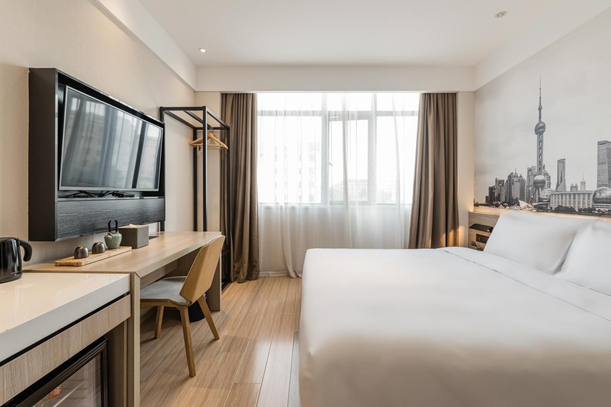 เอทัวร์ ไลท์ โฮเต็ล เซี่ยงไฮ้ หงเฉียว เป่ยซินจิงเมโทรสเตชั่น Hotel ภายนอก รูปภาพ